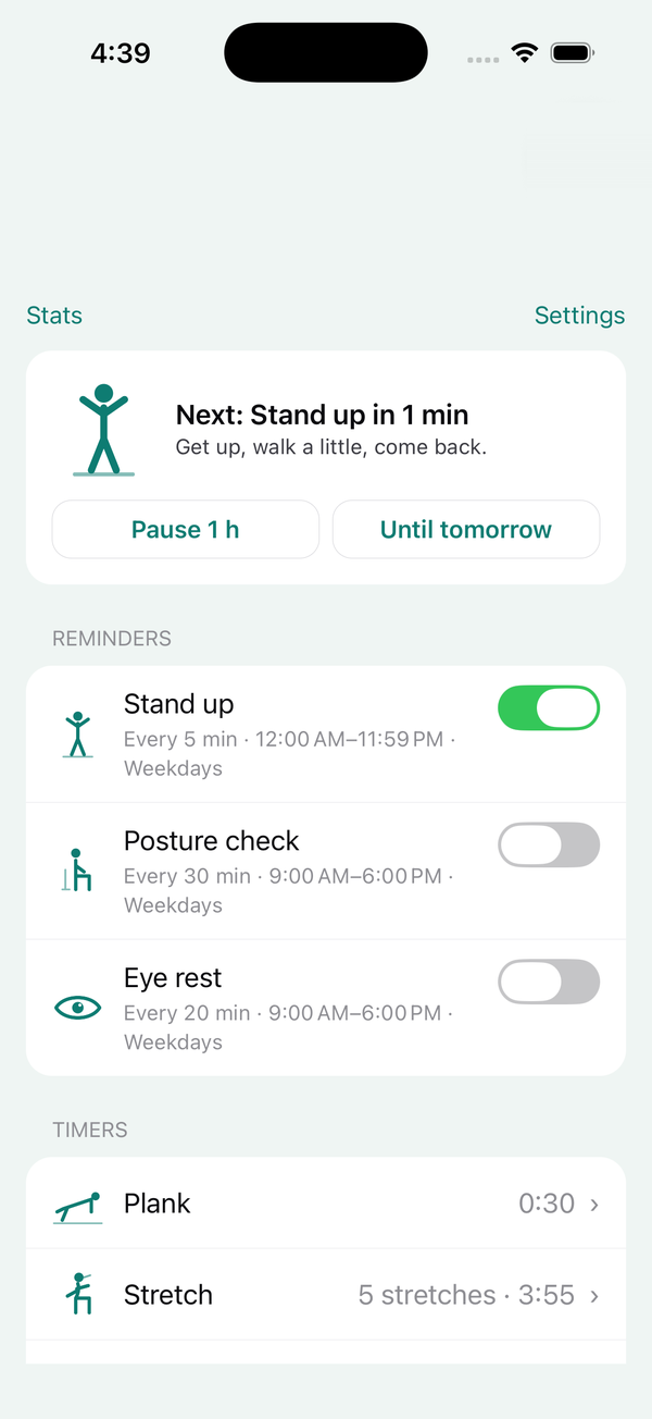 Desk Health home screen showing the next stand-up reminder, three reminder toggles and the plank and stretch timers